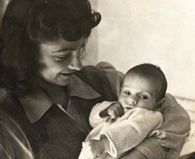Andrew as a baby, with his mother